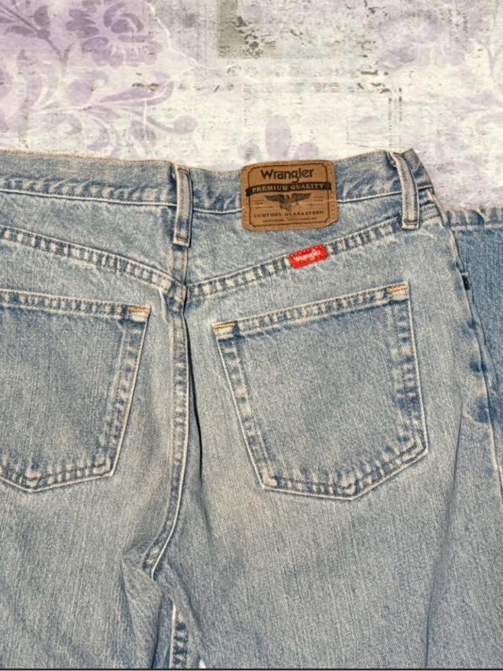 Wrangler Faded Blue Denim Jeans with Red Logo Tag